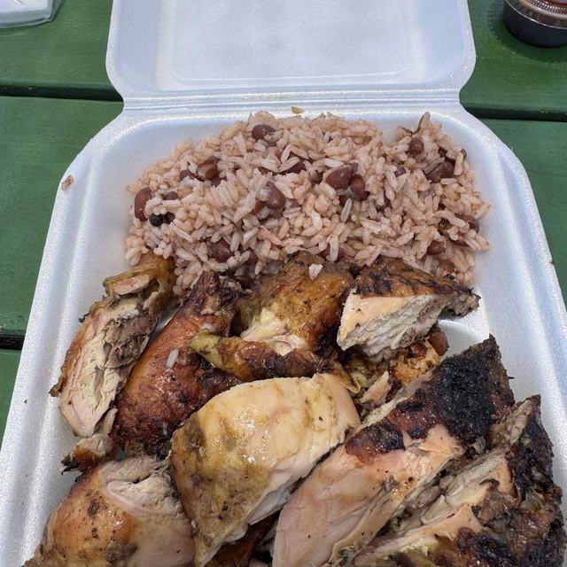 Jerk chicken with rice and peas